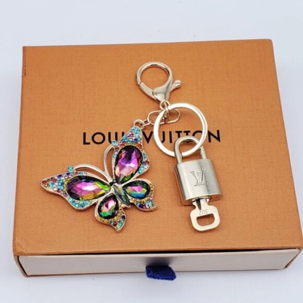 Authentic Louis Vuitton Gold Lock & Box w/ Unbranded Butterfly Bagcharm 122725